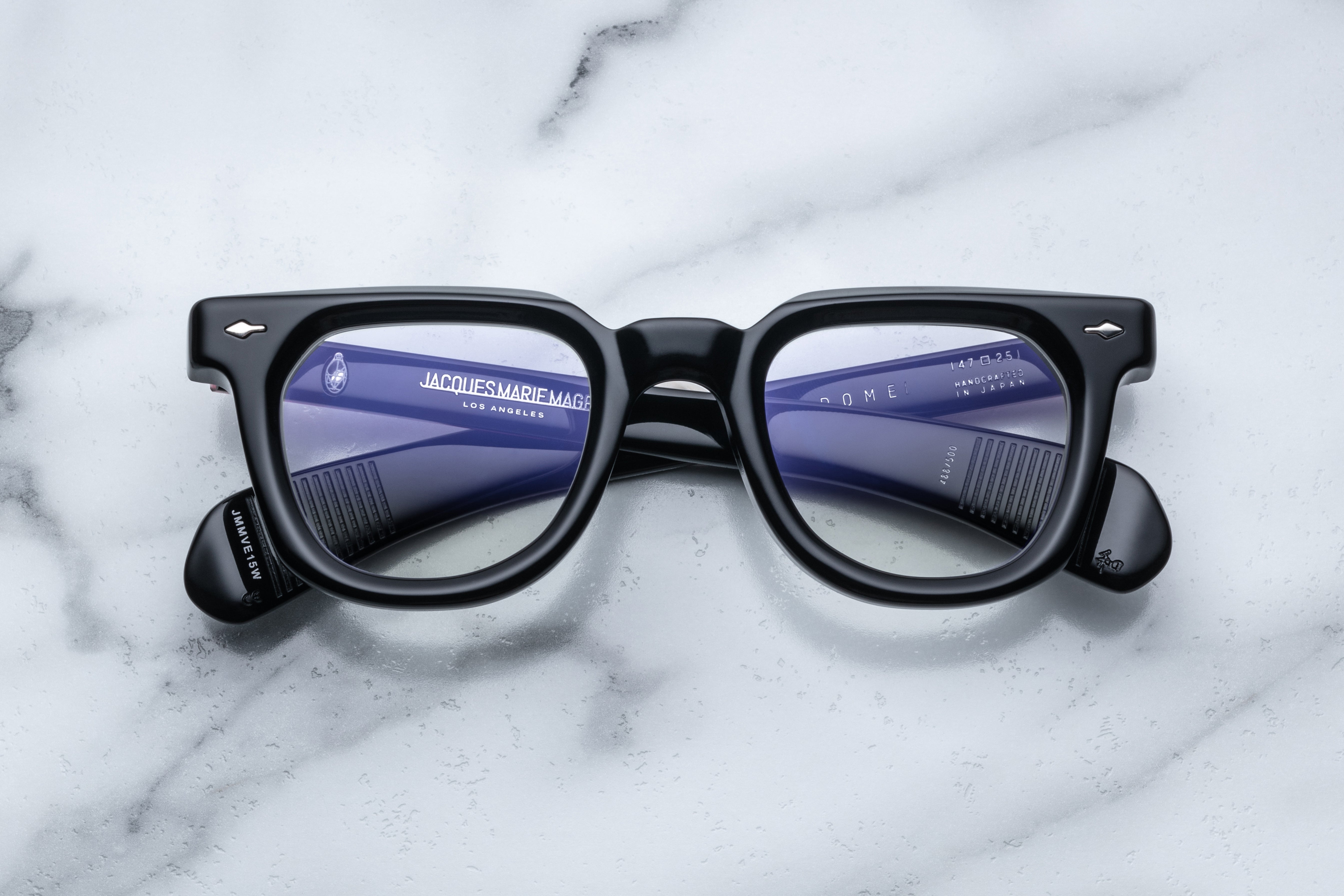 Jacques Marie Mage Vendome Saber RX optical glasses with clear lenses and stylish black frames, front view.