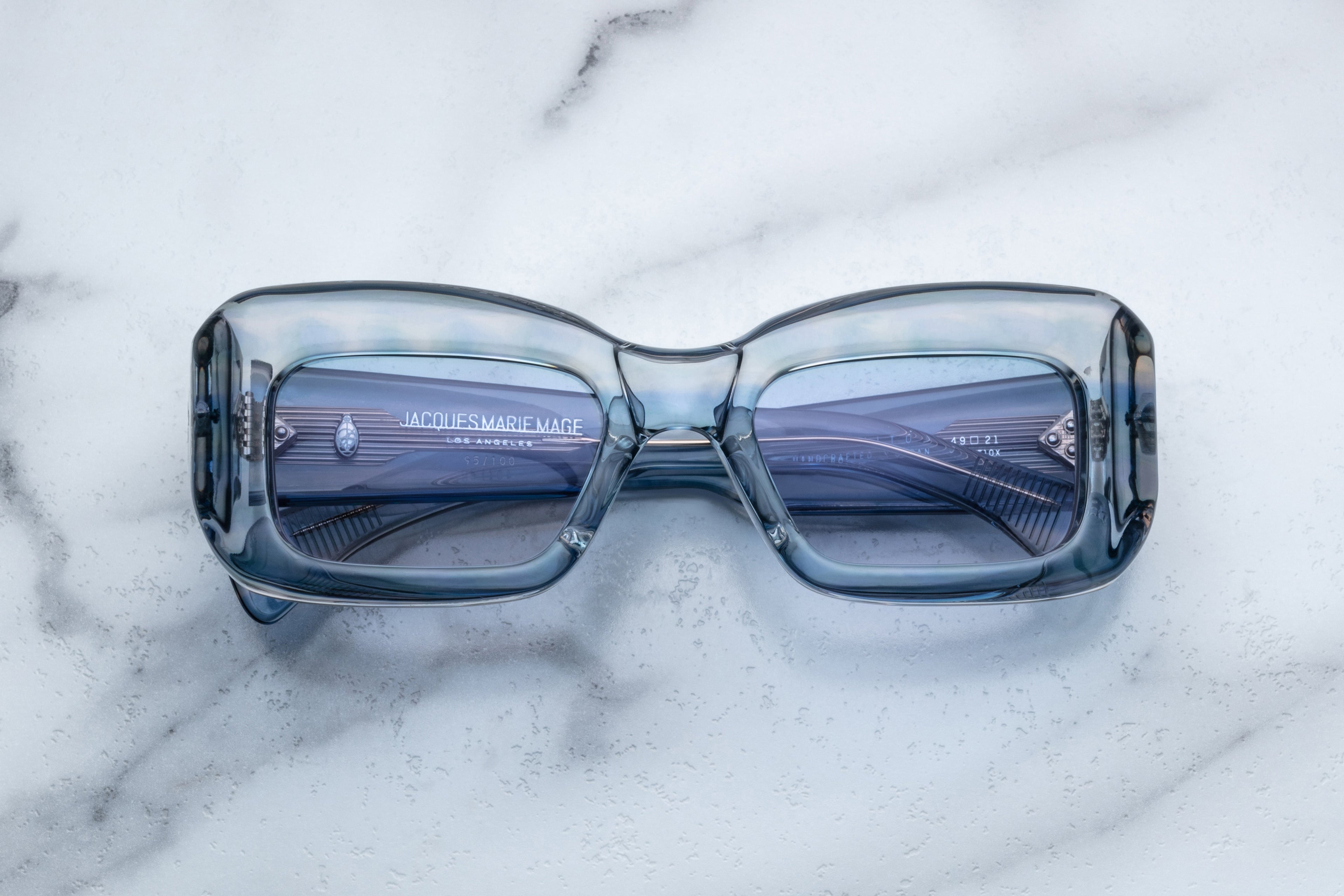 Jacques Marie Mage VITO sunglasses with pampas-colored frames and clear lenses, front view showing sleek, modern design.