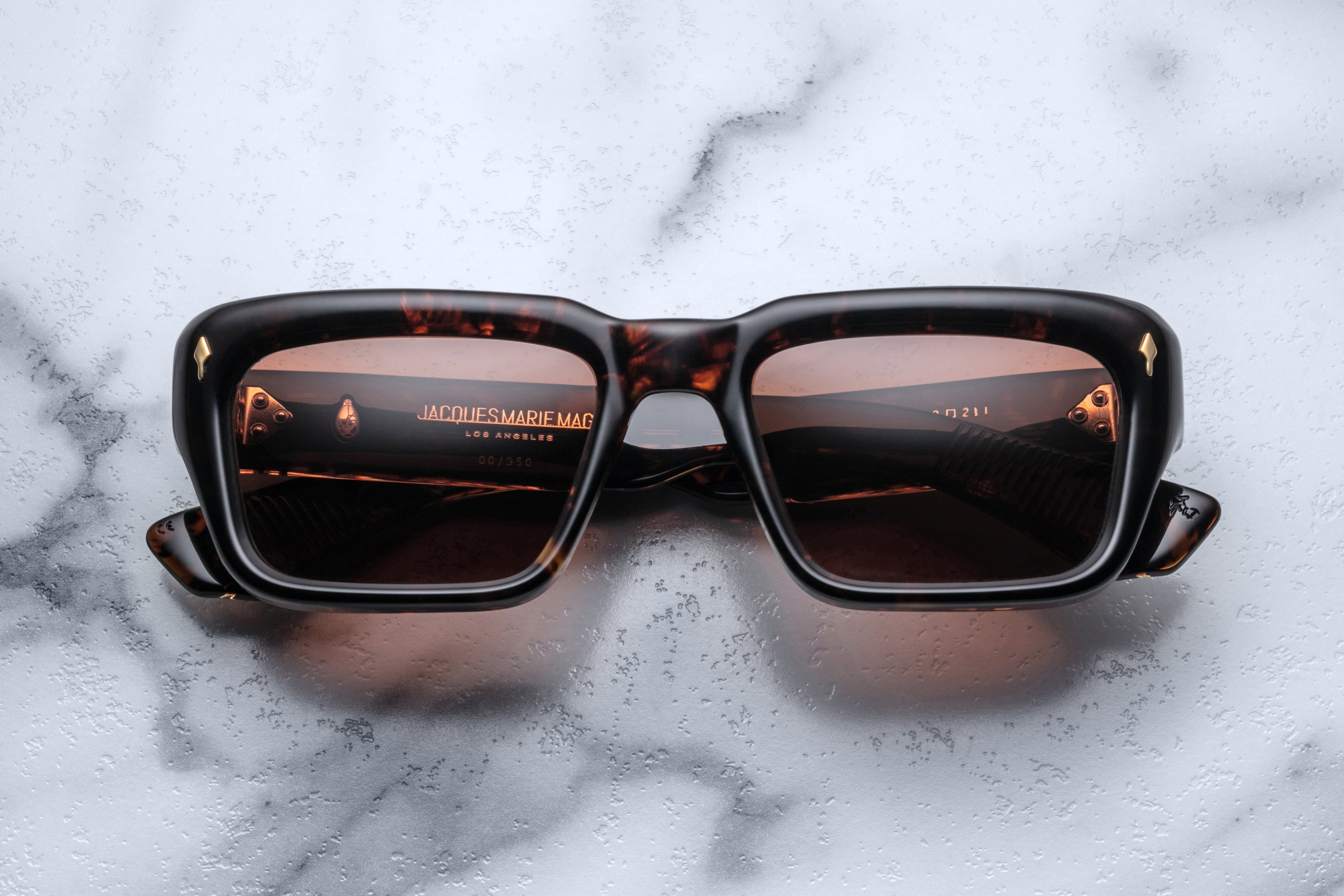 Jacques Marie Mage Walker sunglasses featuring dark tinted lenses and sleek black frames, front view.