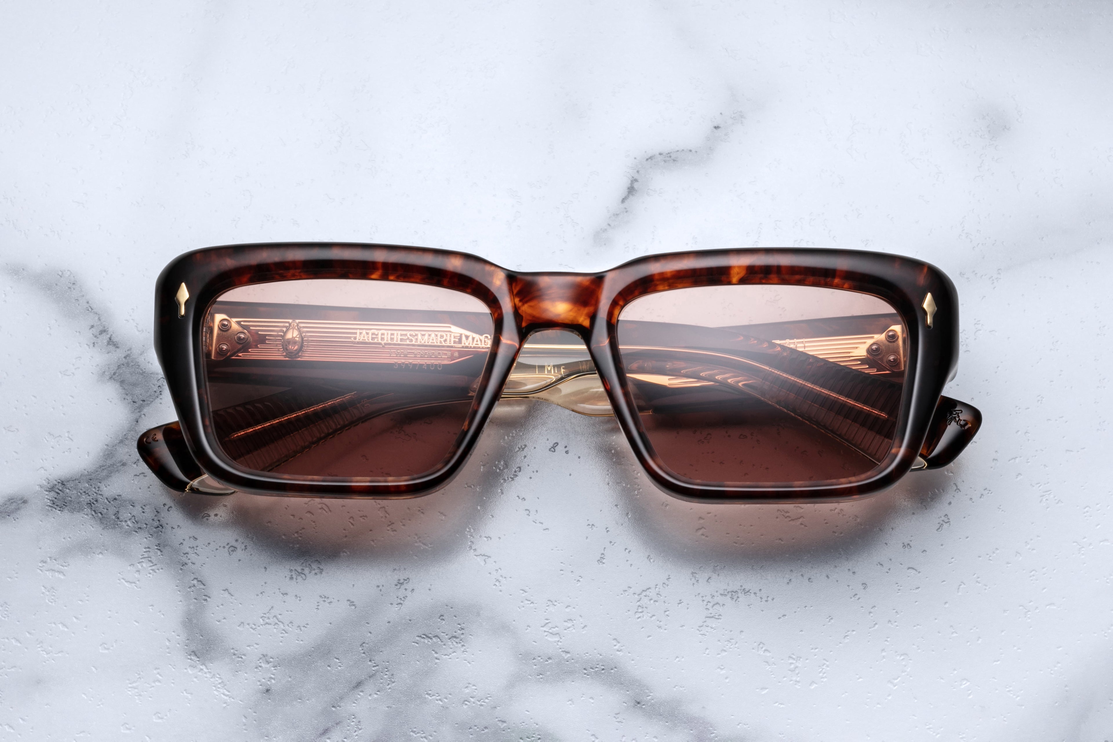 Jacques Marie Mage Walker sunglasses with argyle pattern on the front, stylish and modern eyewear for fashion and UV protection.