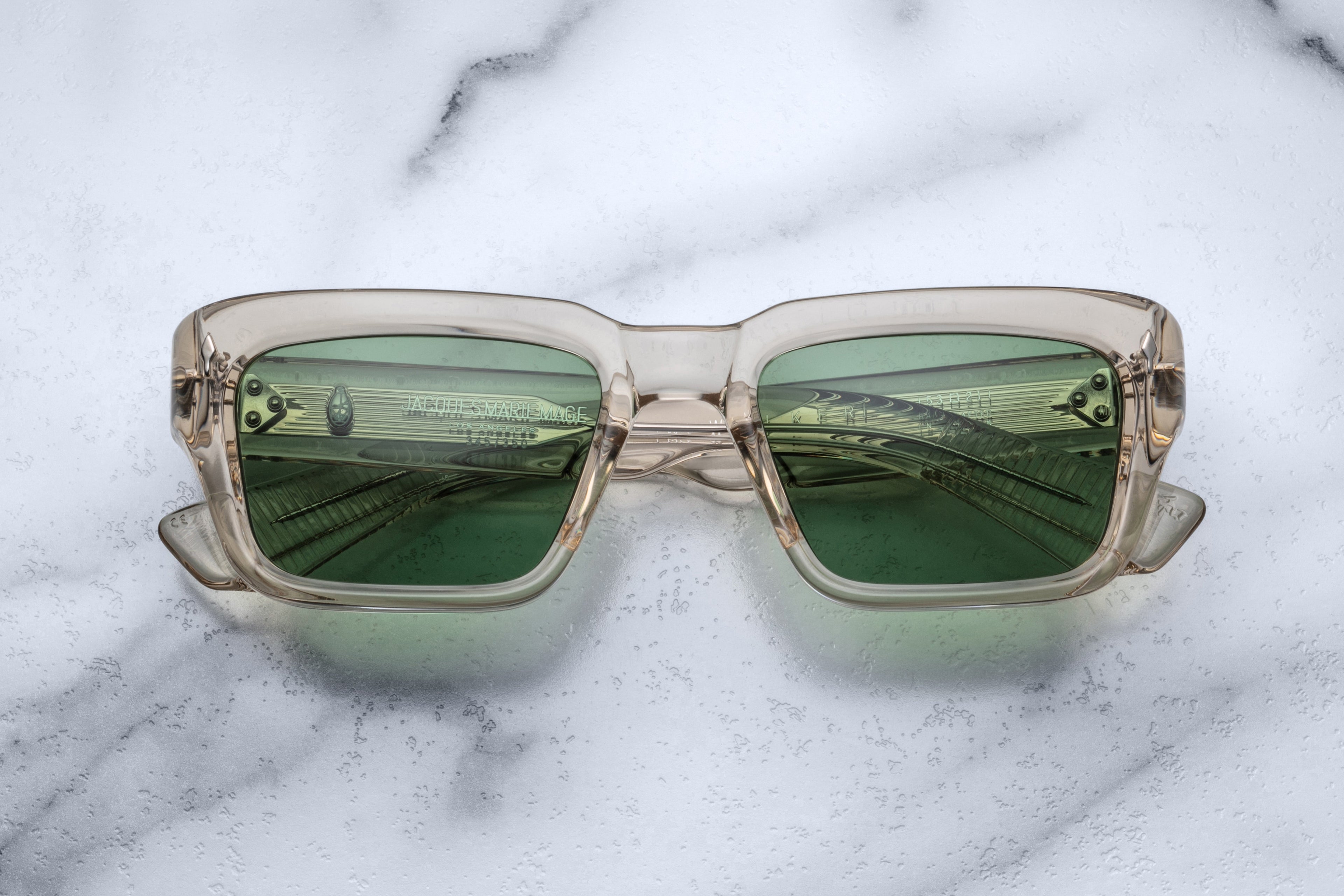Jacques Marie Mage Walker beige sunglasses with rounded frames and clear lenses, front view showing stylish design.
