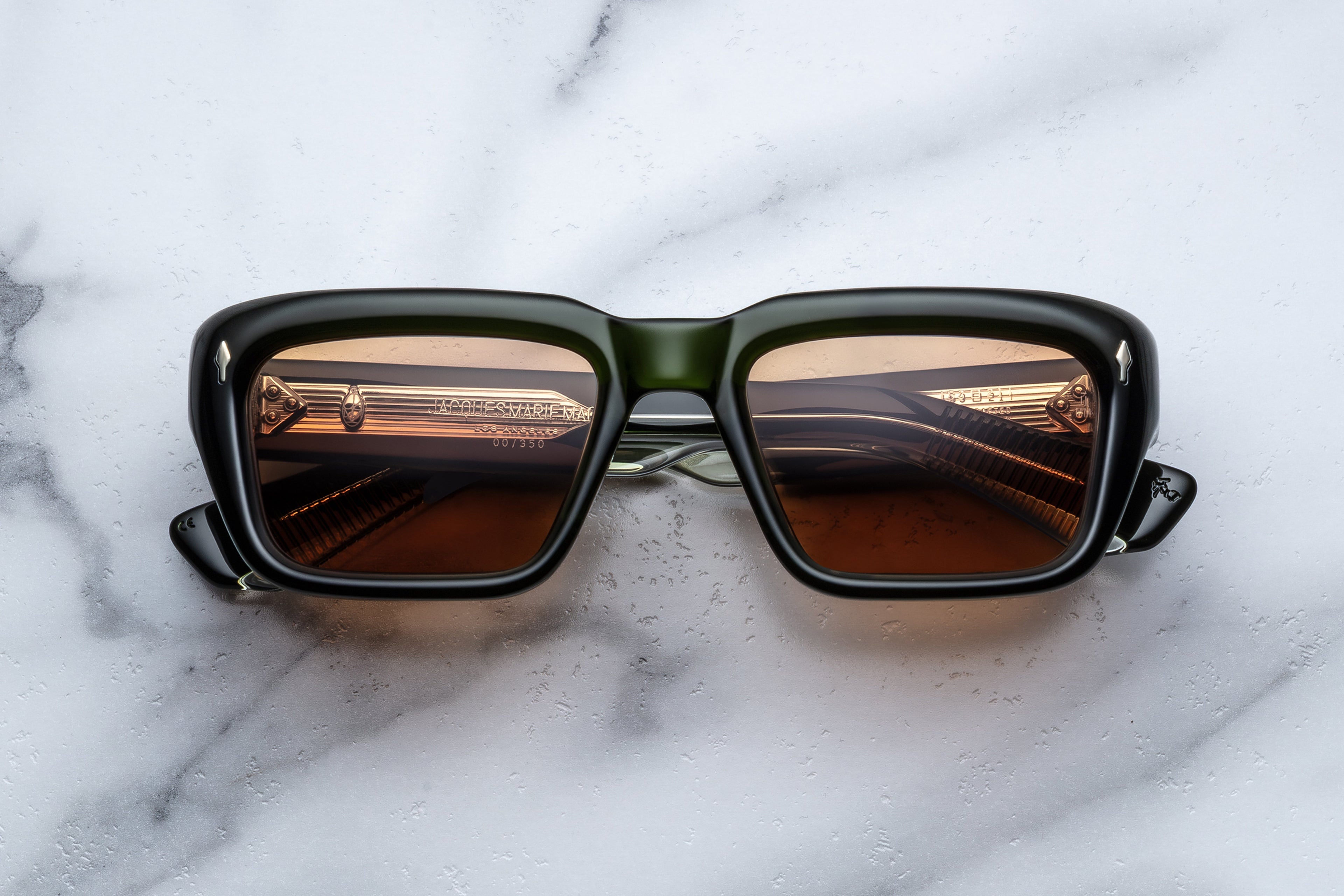 Jacques Marie Mage Walker sunglasses with Borneo-colored frames, front view showing stylish and modern eyewear design.