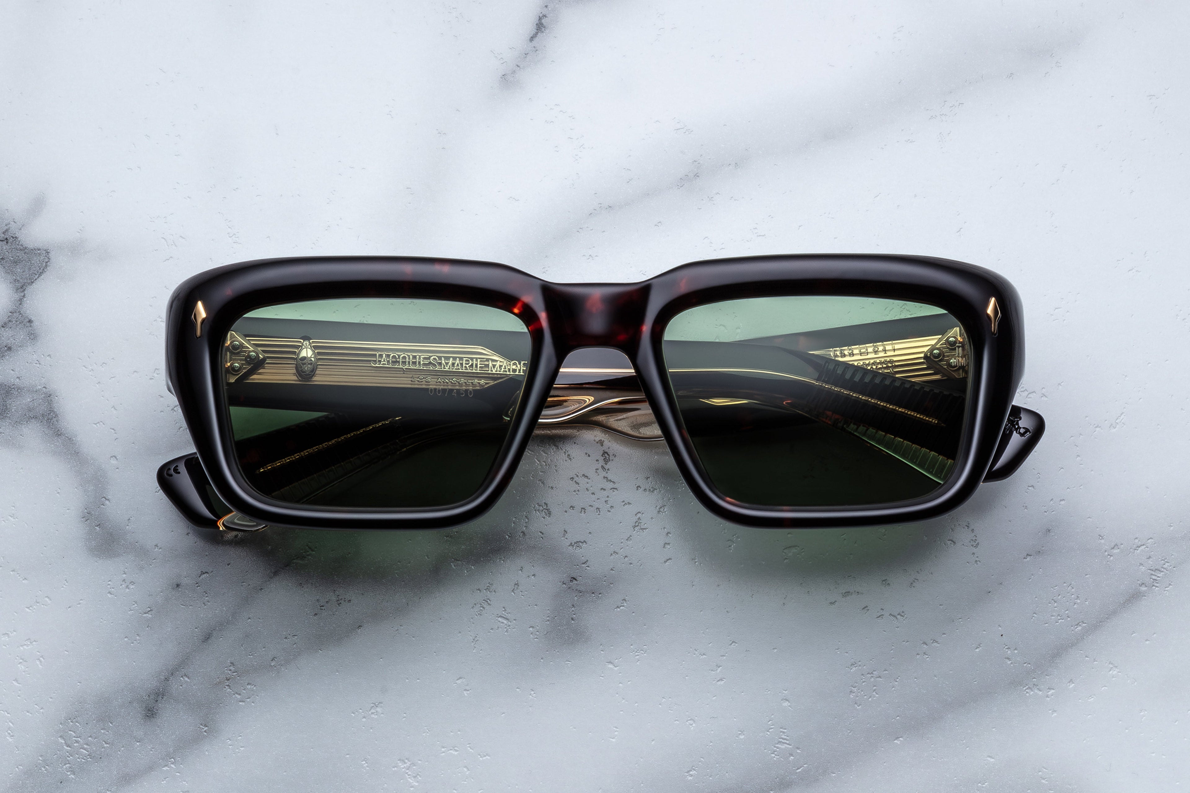 Jacques Marie Mage Walker sunglasses with a sleek front view, stylish frame design, and dark tinted lenses.