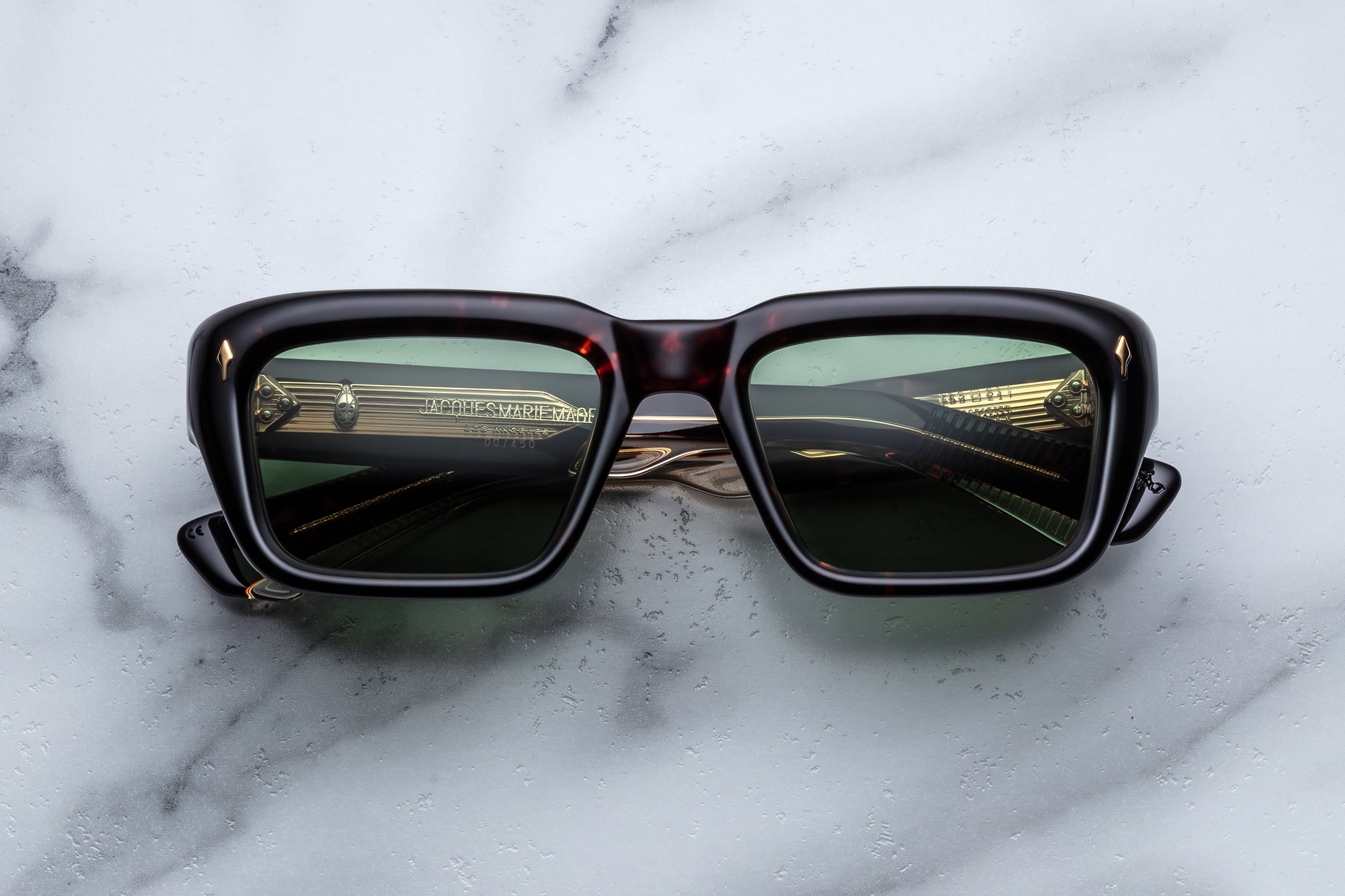 Jacques Marie Mage Walker sunglasses with a sleek front view, stylish frame design, and dark tinted lenses.