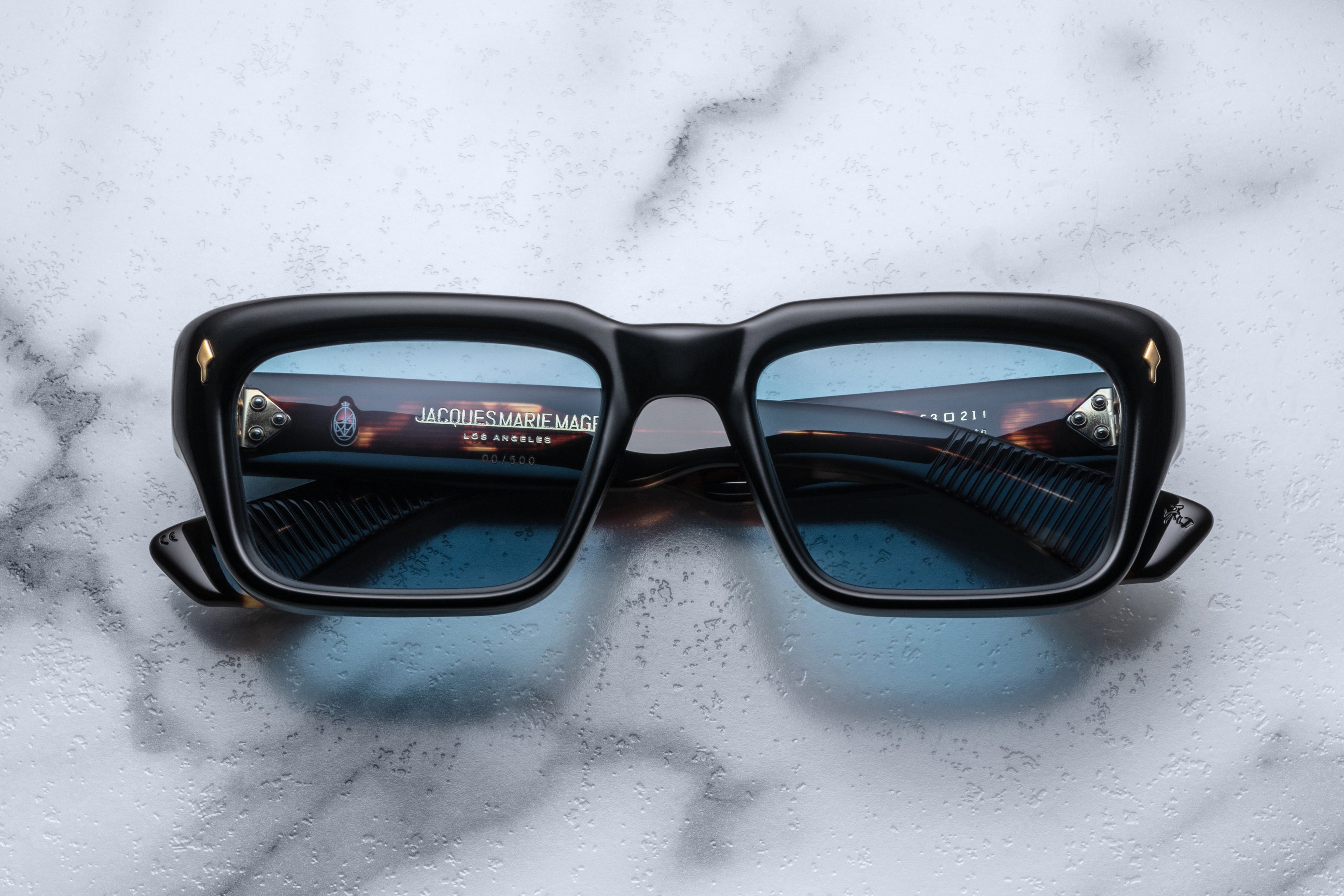 Jacques Marie Mage Walker sunglasses with black frame and clear lenses, stylish eyewear for a modern look.