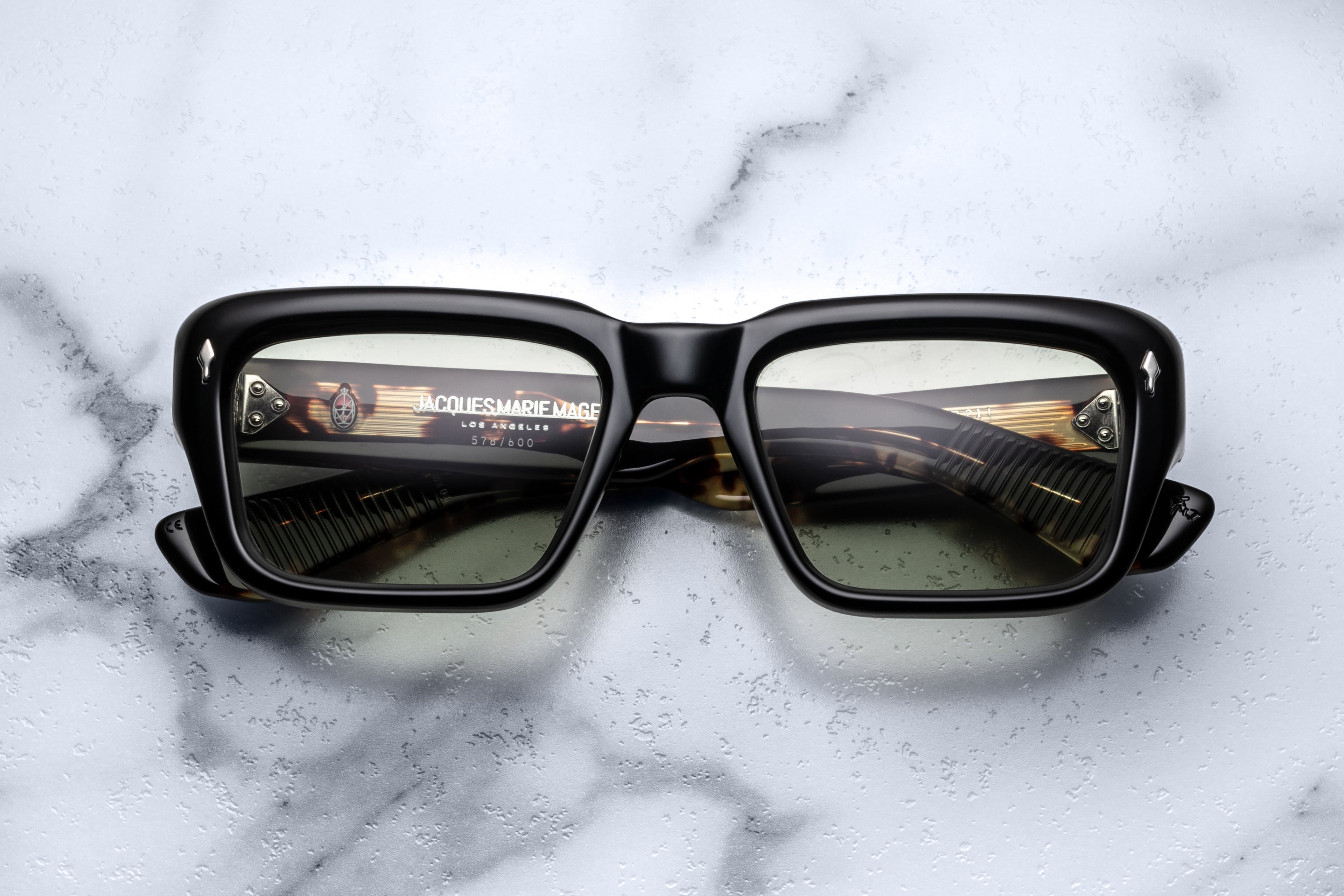 Jacques Marie Mage Walker Noir sunglasses with black frames and clear lenses, front view showing stylish design.