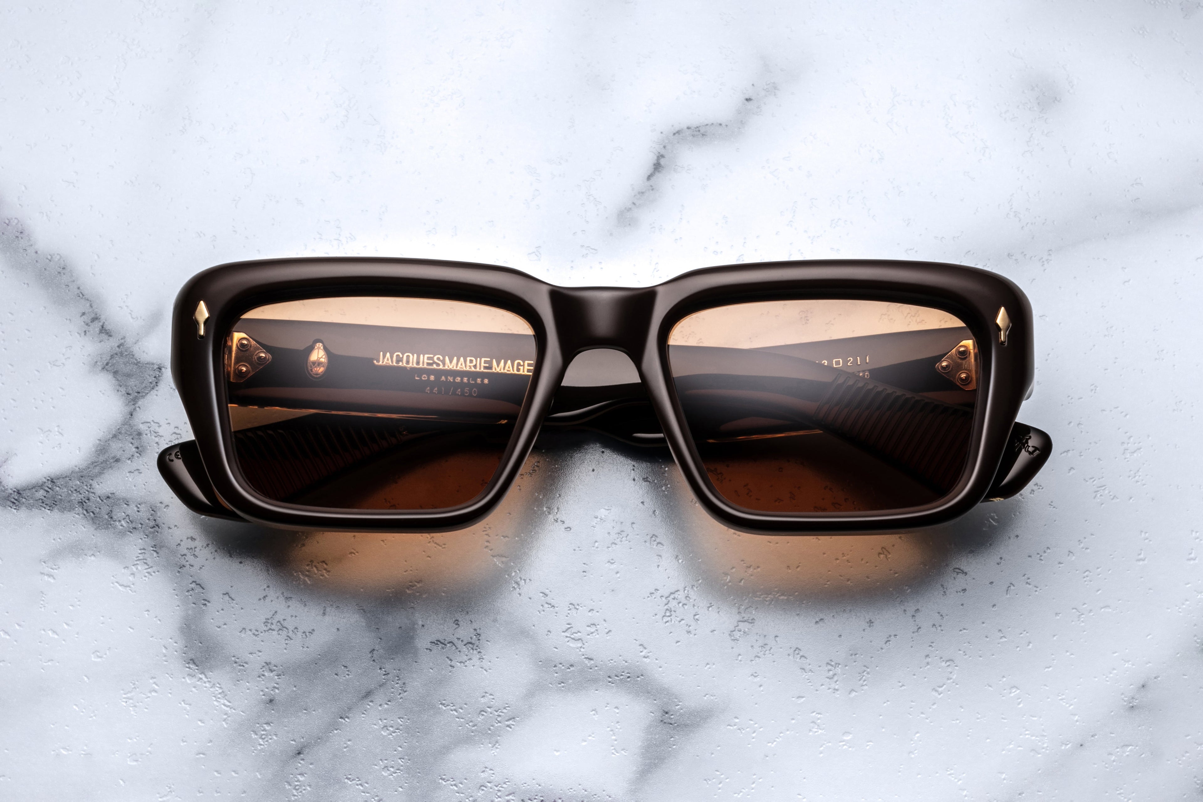 Jacques Marie Mage Walker sunglasses with walnut-colored frames, front view showing sleek, stylish design and tinted lenses.