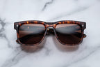 Jacques Marie Mage Wesley sunglasses with Samoa-style frames, front view showing sleek design and tinted lenses.
