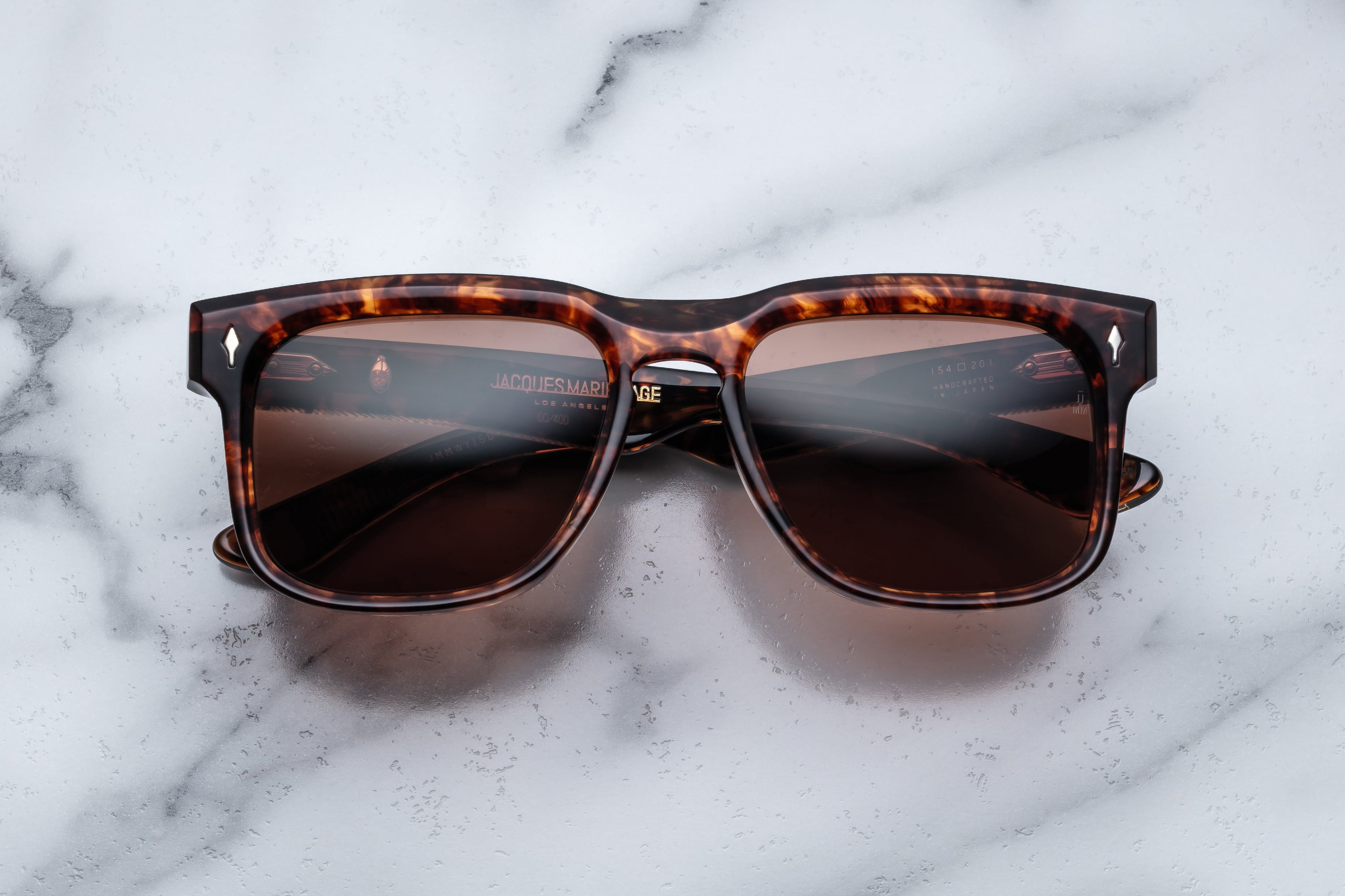 Jacques Marie Mage Wesley sunglasses with Samoa-style frames, front view showing sleek design and tinted lenses.