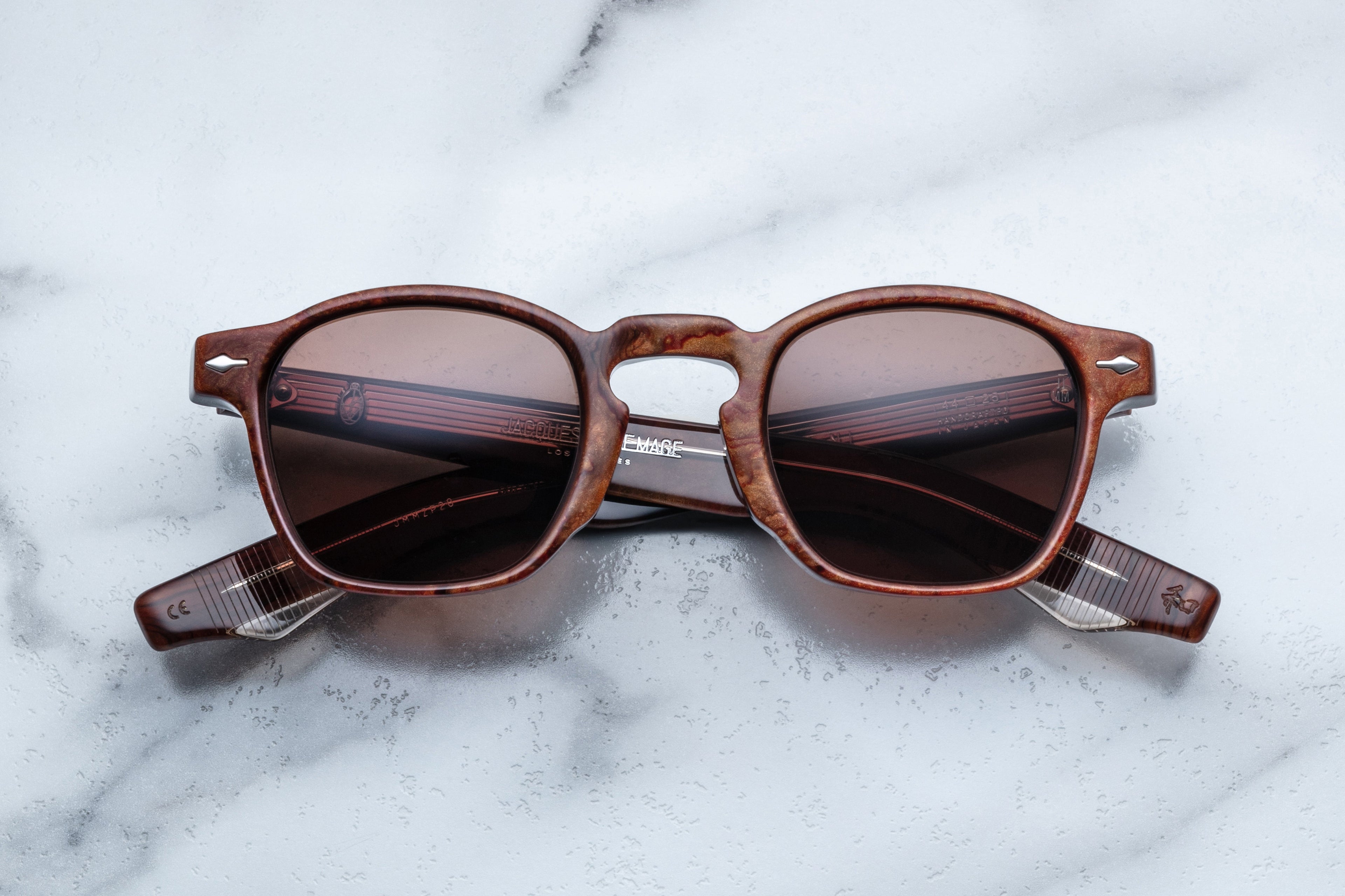 Jacques Marie Mage Zephirin sunglasses with burlwood frames and dark lenses, front view showing stylish and sophisticated design.