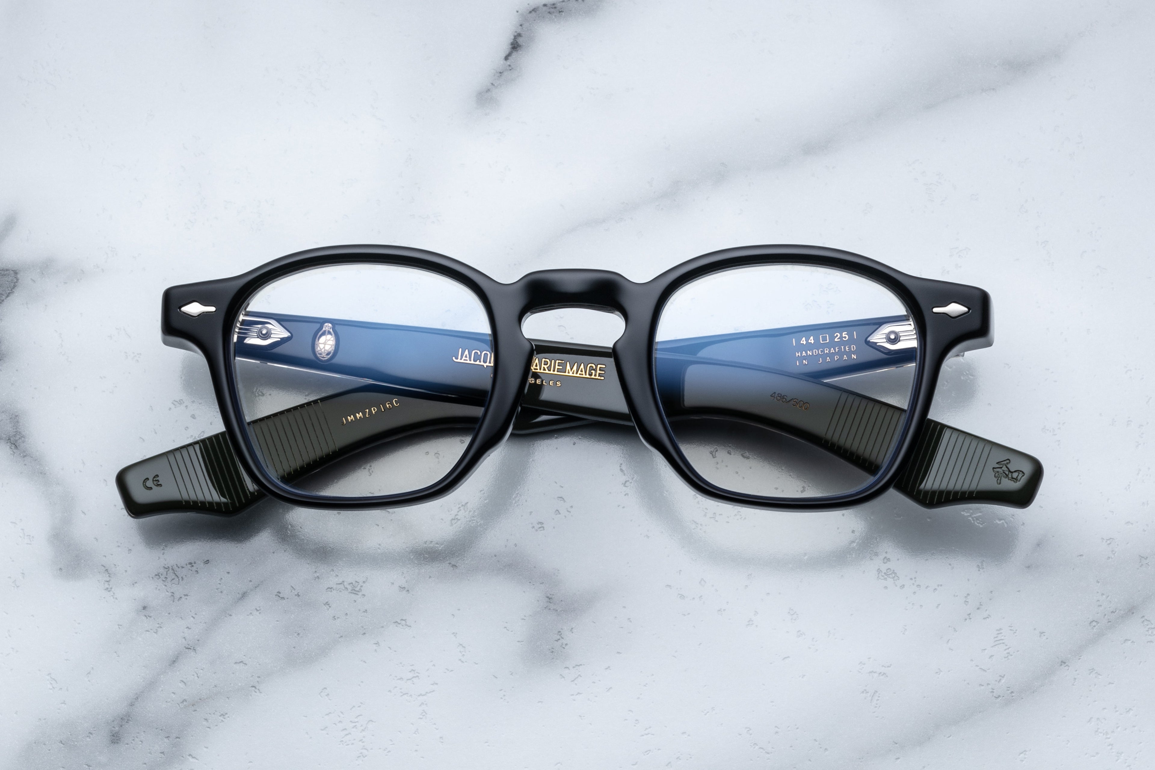 Jacques Marie Mage Zephirin Cobra RX optical glasses with round black frames and clear lenses, front view showing detailed design.