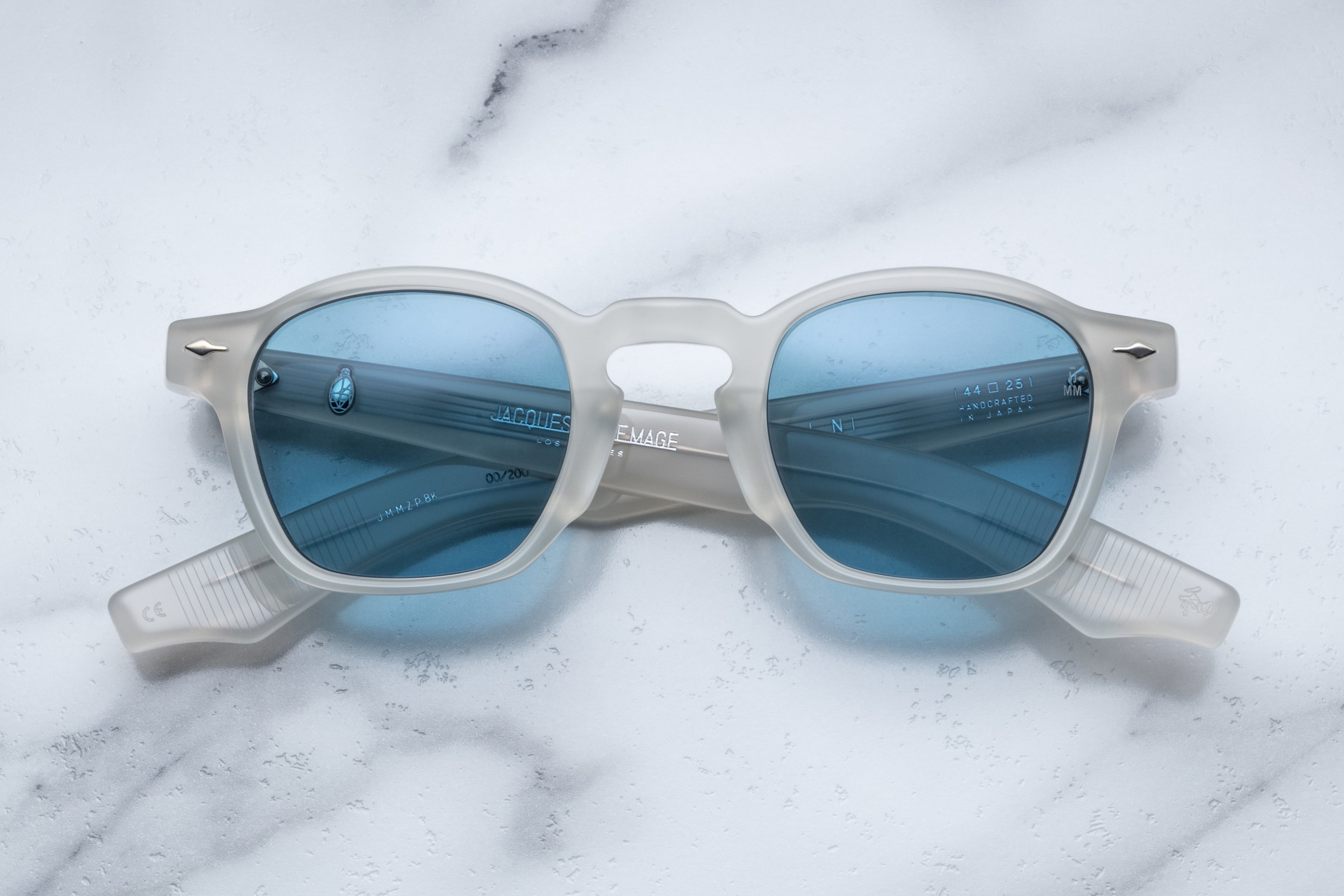 Jacques Marie Mage Zephirin Dune sunglasses with rounded frames and tinted lenses, front view showing stylish design.