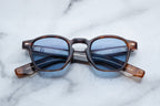 Jacques Marie Mage Zephirin Havana sunglasses with rounded frames and dark tinted lenses, front view showing stylish design.