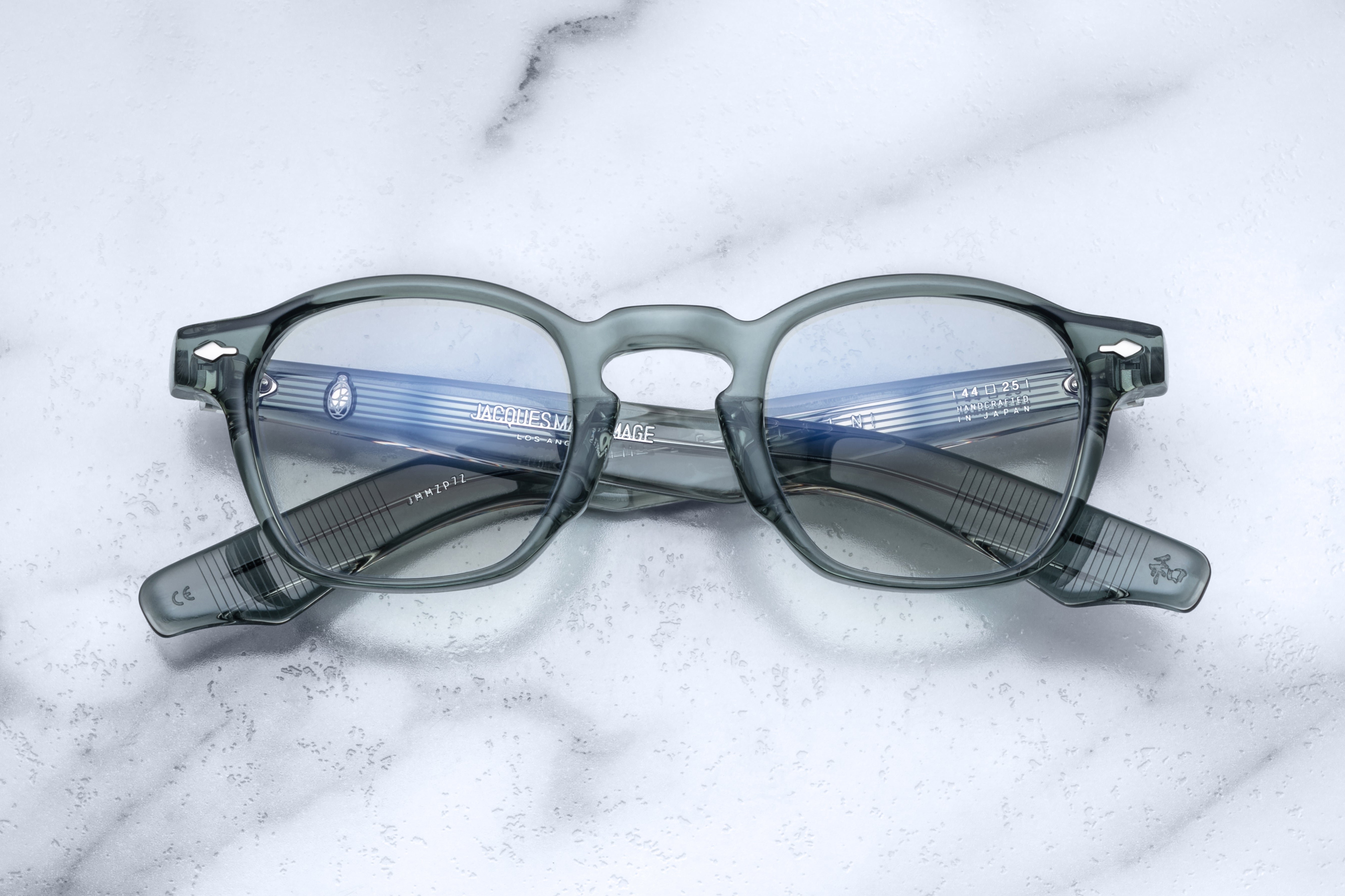 Jacques Marie Mage Zephirin optical glasses with juniper-colored frames, front view showcasing stylish design and clear lenses.