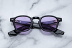 Jacques Marie Mage Zephirin Maverick sunglasses with bold black frames and tinted lenses, shown from the front.