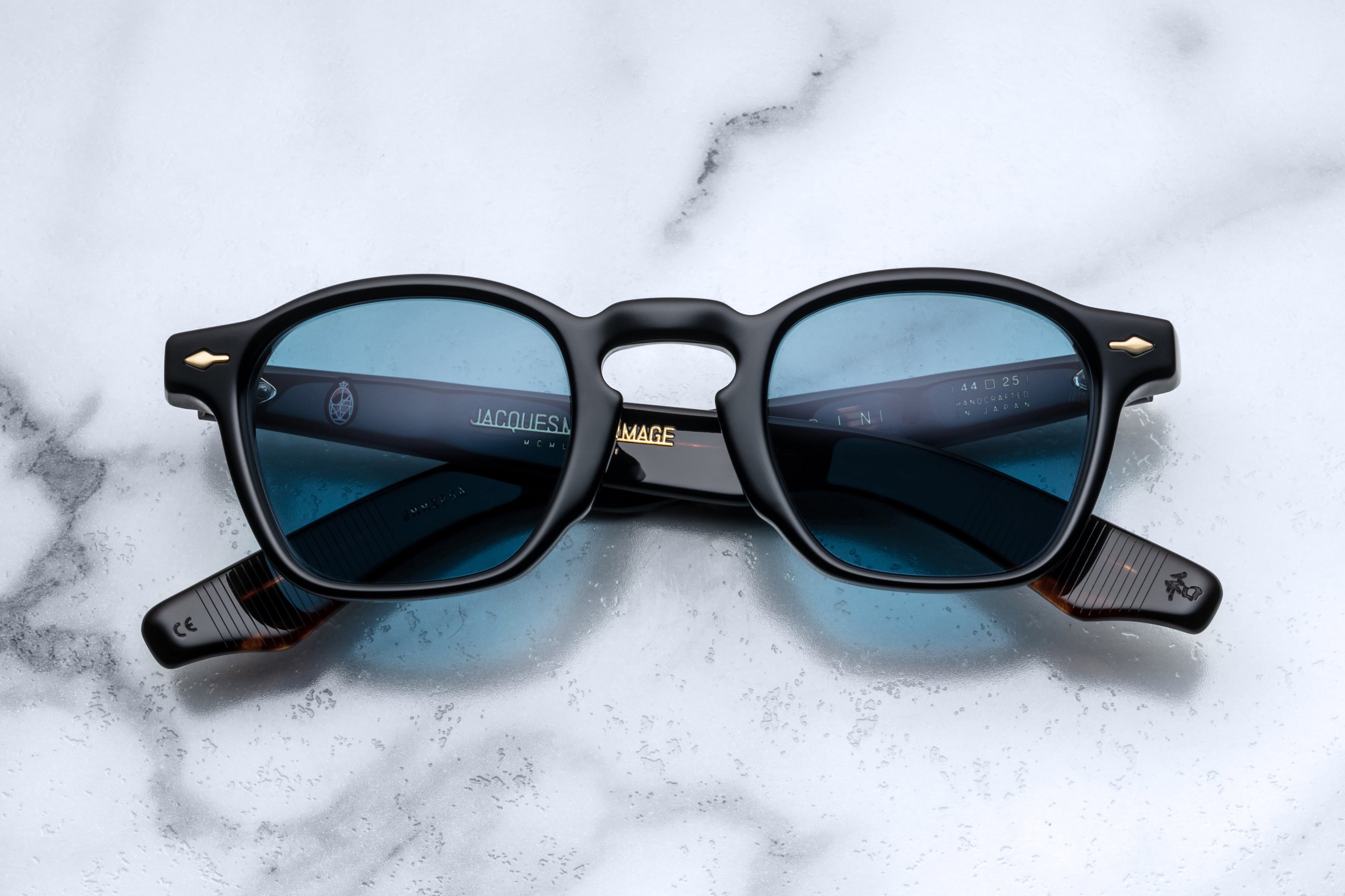 Jacques Marie Mage Zephirin Noir sunglasses with round frames and dark lenses, front view showing sleek, stylish design.
