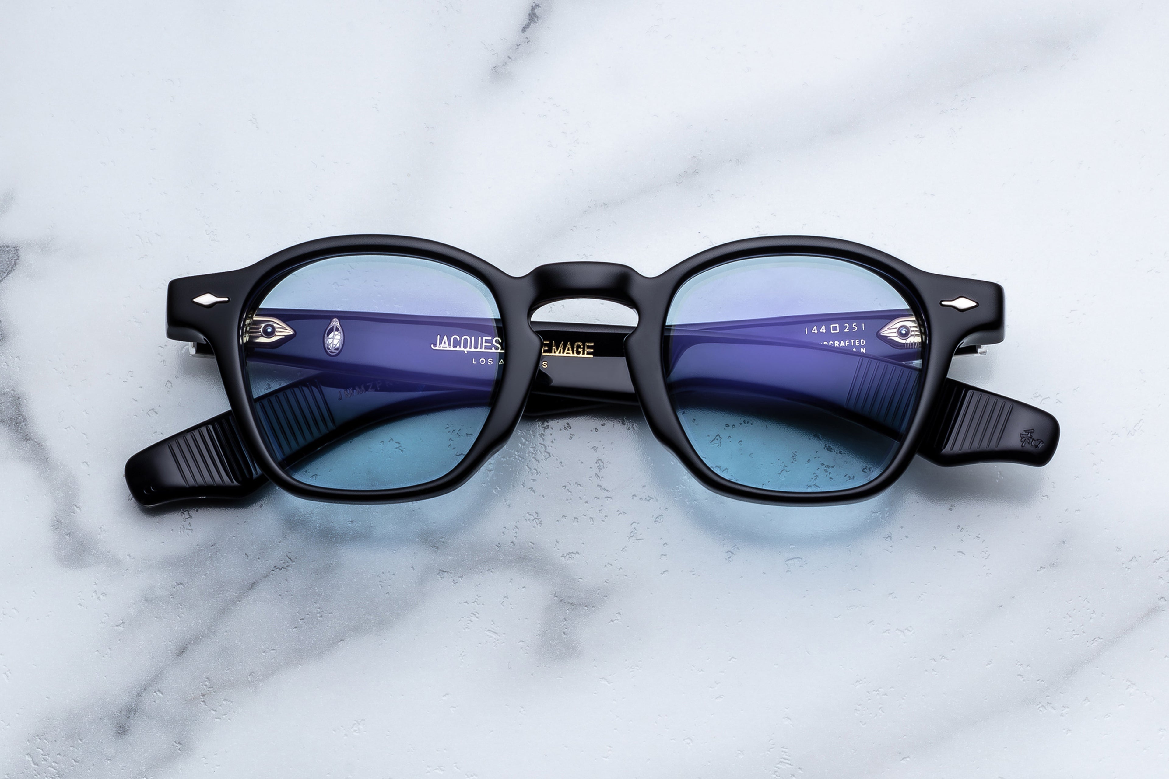 Jacques Marie Mage Zephirin sunglasses with dark tinted lenses and sleek black frame, front view.