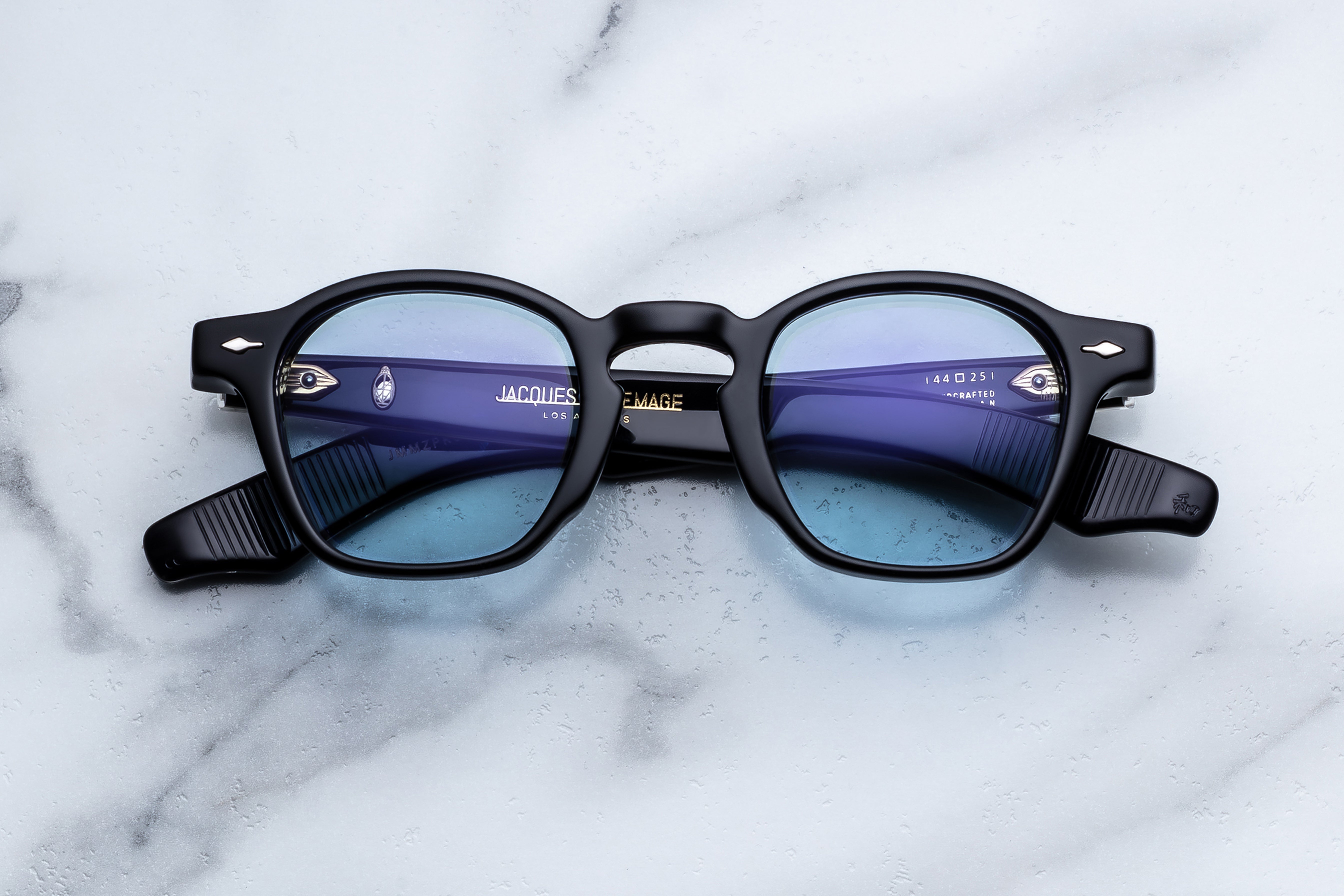 Jacques Marie Mage Zephirin sunglasses with dark tinted lenses and sleek black frame, front view.