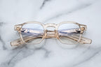 Jacques Marie Mage Zephirin Pearl optical glasses with rounded frames and clear lenses, front view showing intricate design details.