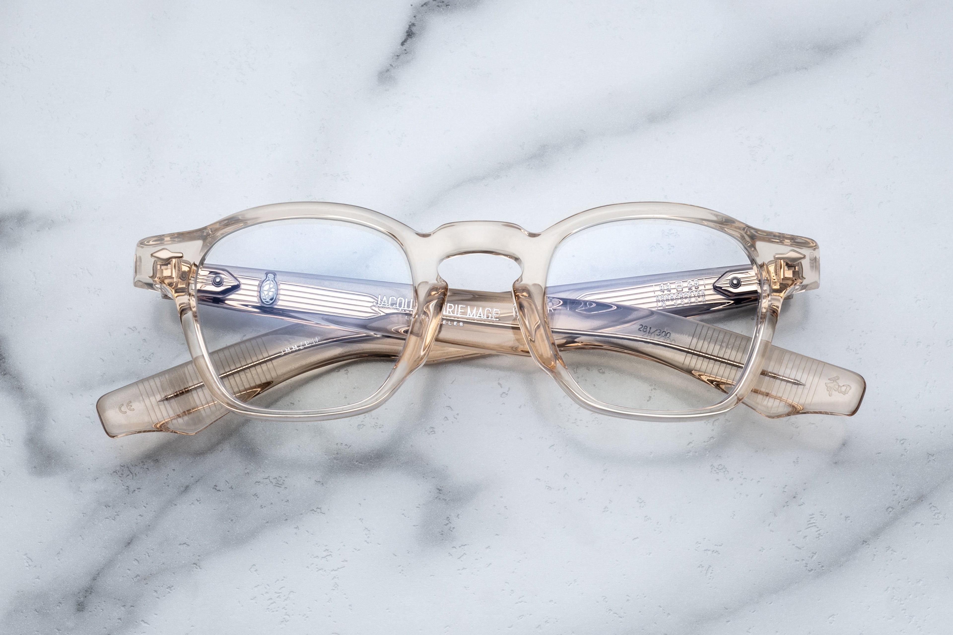Jacques Marie Mage Zephirin Pearl optical glasses with rounded frames and clear lenses, front view showing intricate design details.