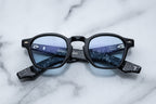 Jacques Marie Mage Zephirin sunglasses with round frames and dark tinted lenses, front view showing sleek design.