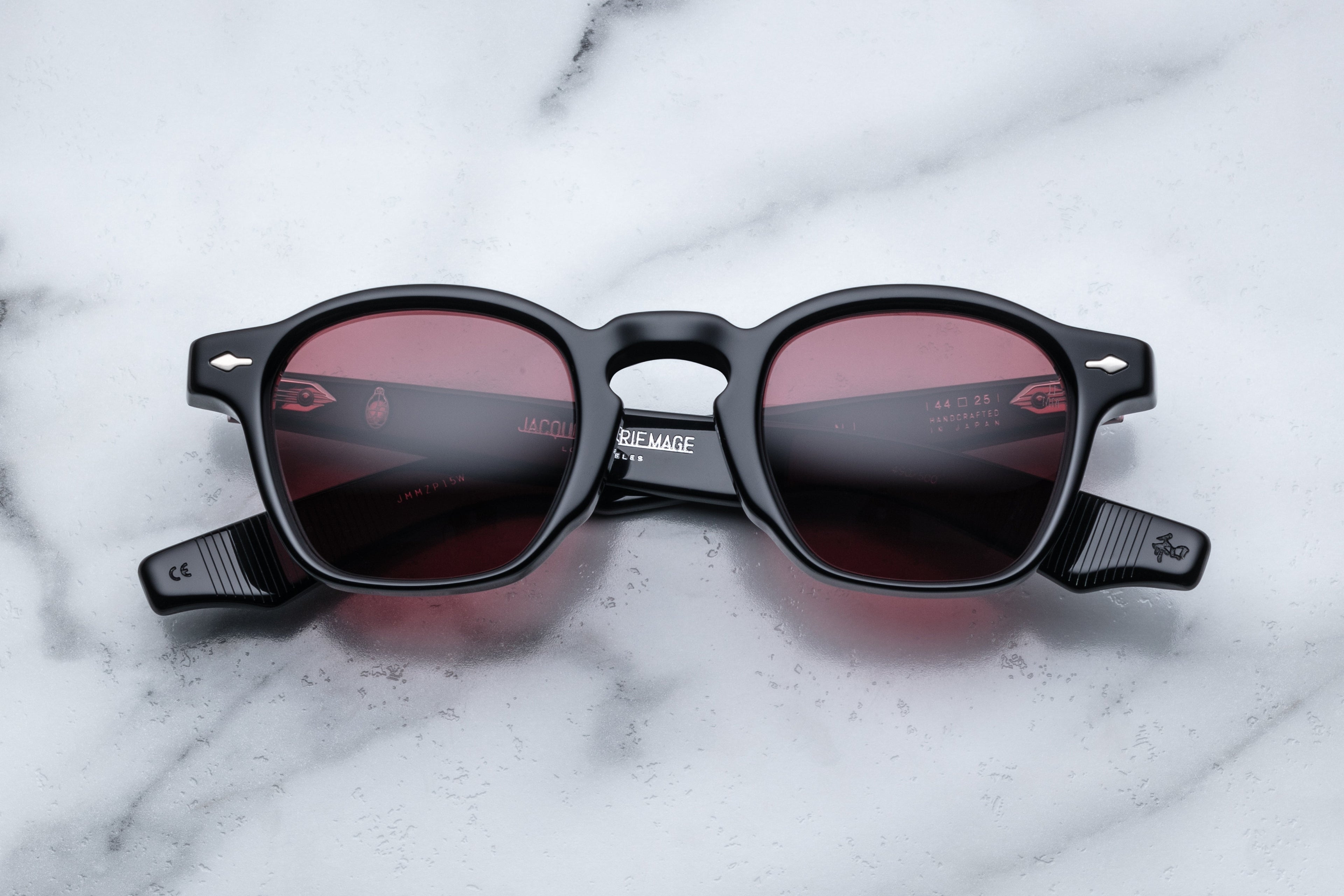 Jacques Marie Mage Zephirin sunglasses with rounded frames and dark tinted lenses, front view showing stylish design.