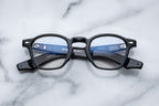 Jacques Marie Mage Zephirin Saber RX optical glasses with clear lenses and sleek black frames, front view.