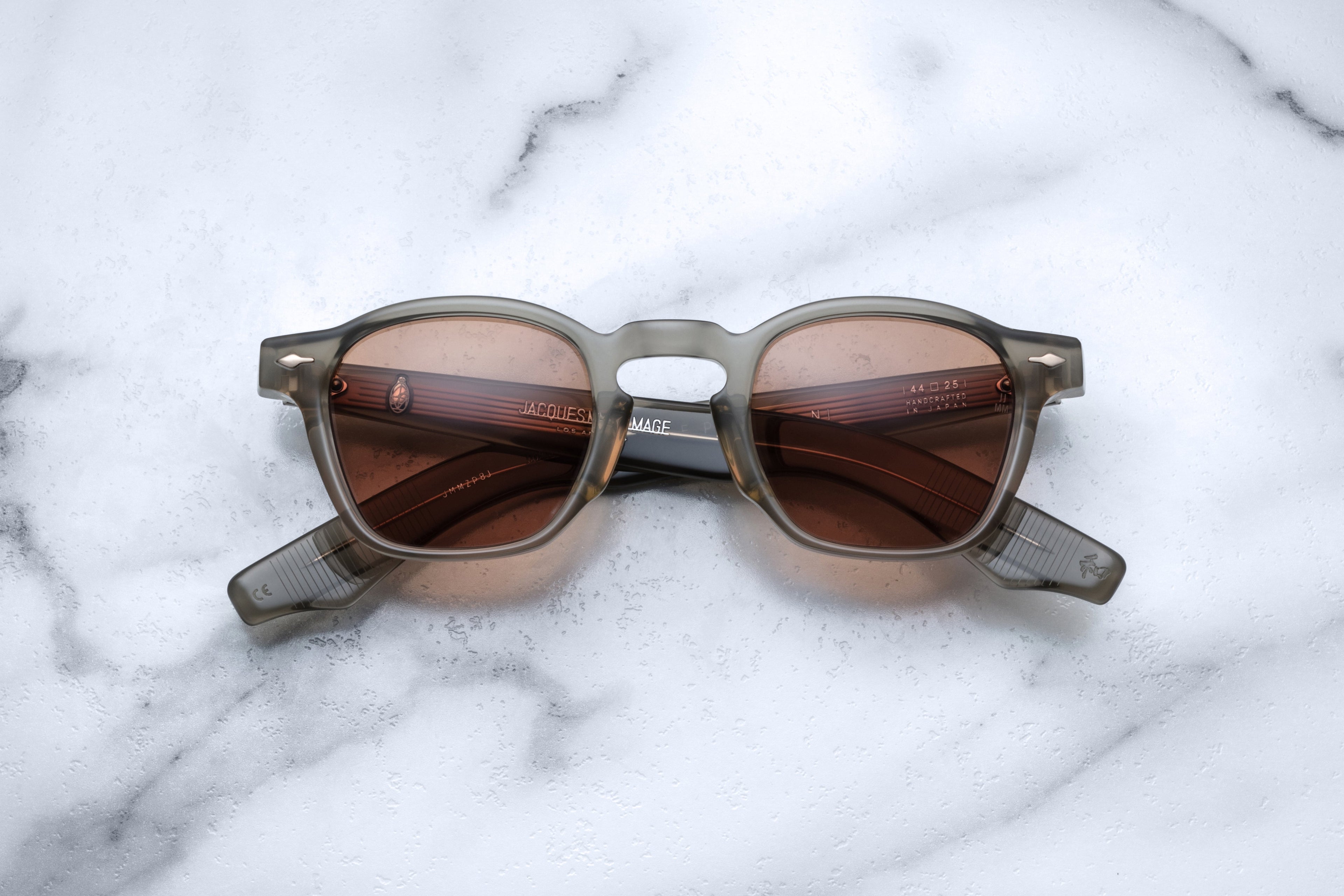 Jacques Marie Mage Zephirin sky grey sunglasses with rounded frames and tinted lenses, front view showing stylish design.