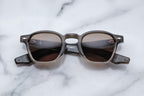 Jacques Marie Mage Zephirin smoke fade sunglasses with rounded frames and tinted lenses, front view showing stylish design.