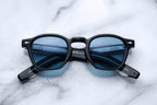 Jacques Marie Mage Zephirin sunglasses with titanium frame and dark lenses, front view showing sleek, modern design.