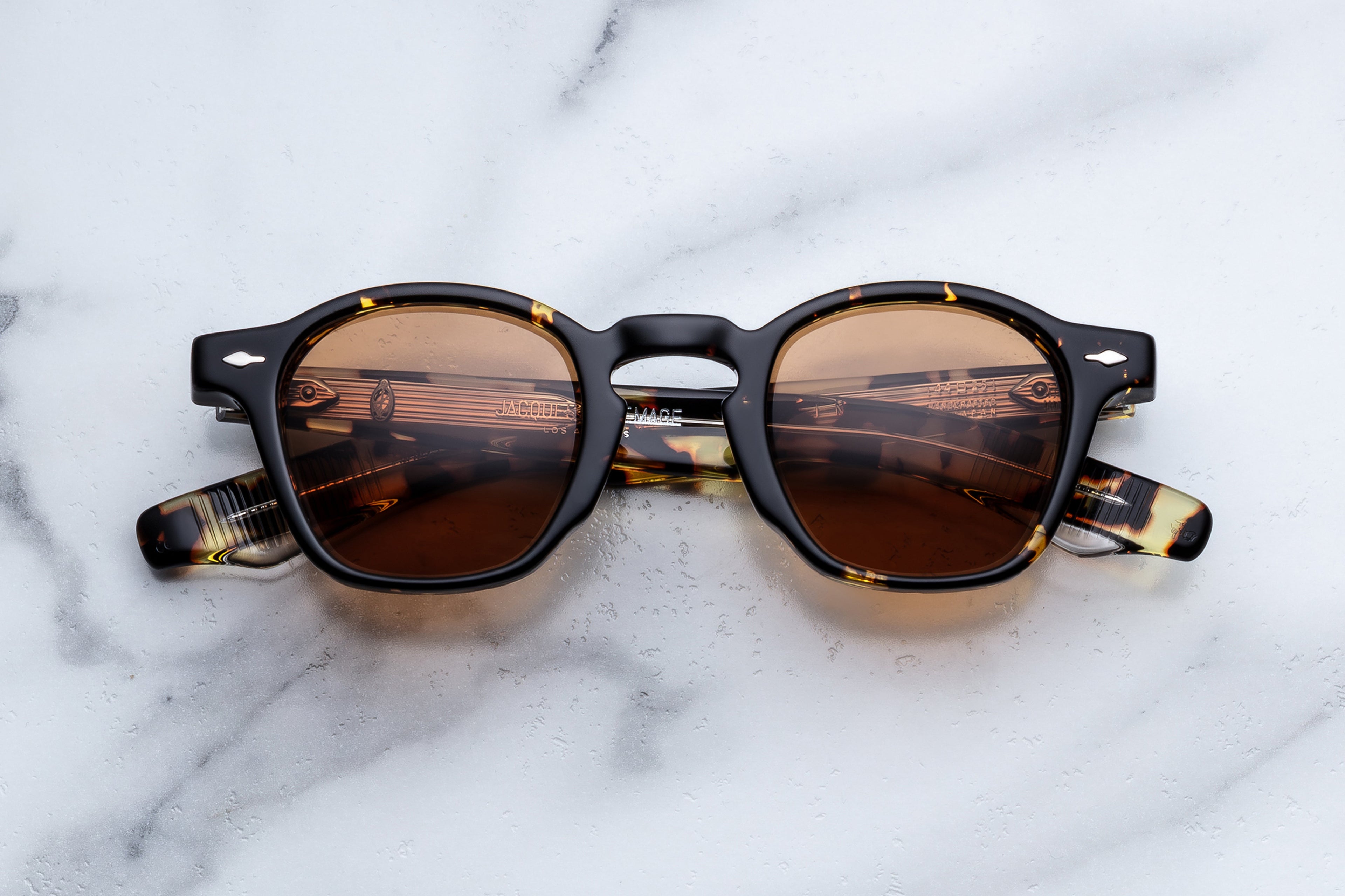 Jacques Marie Mage Zephirin sunglasses with dark tinted lenses and stylish frame, front view image.