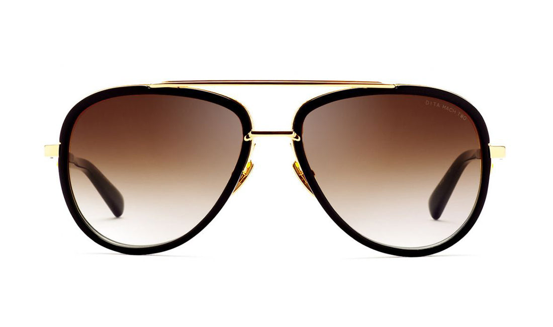 Dita MACH TWO eyeglasses with black frames and round lenses, front view showing sleek design and stylish detail.
