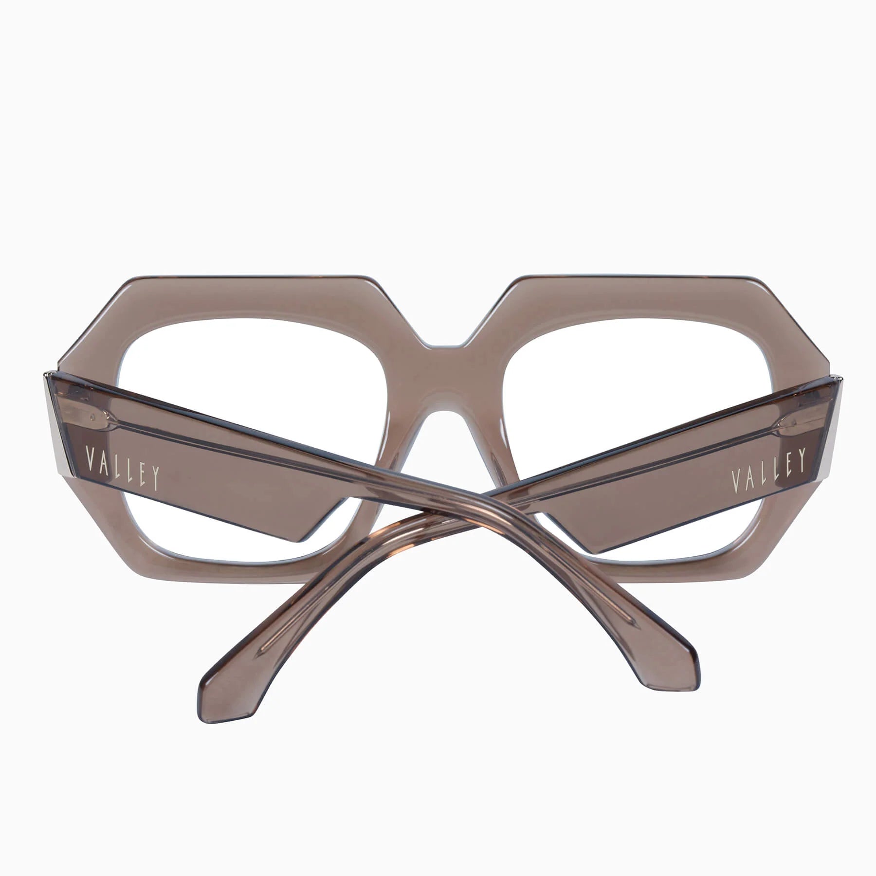 Valley Eyewear Monolith sunglasses with translucent mocha clear frames and dark lenses, stylish and modern eyewear design